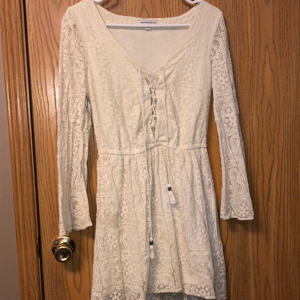 White lace dress with bell sleeves